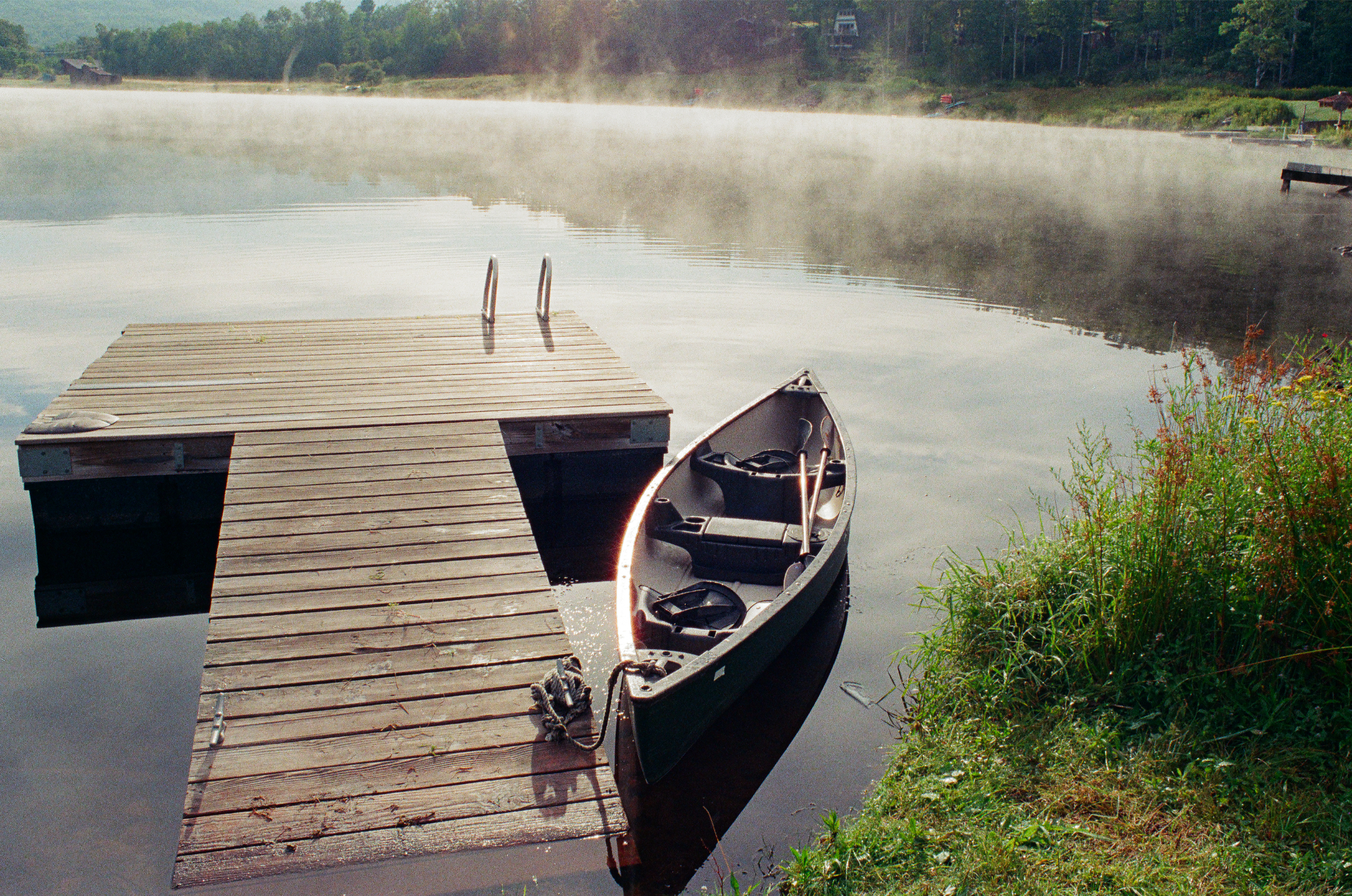 Canoe on the lake at dawn