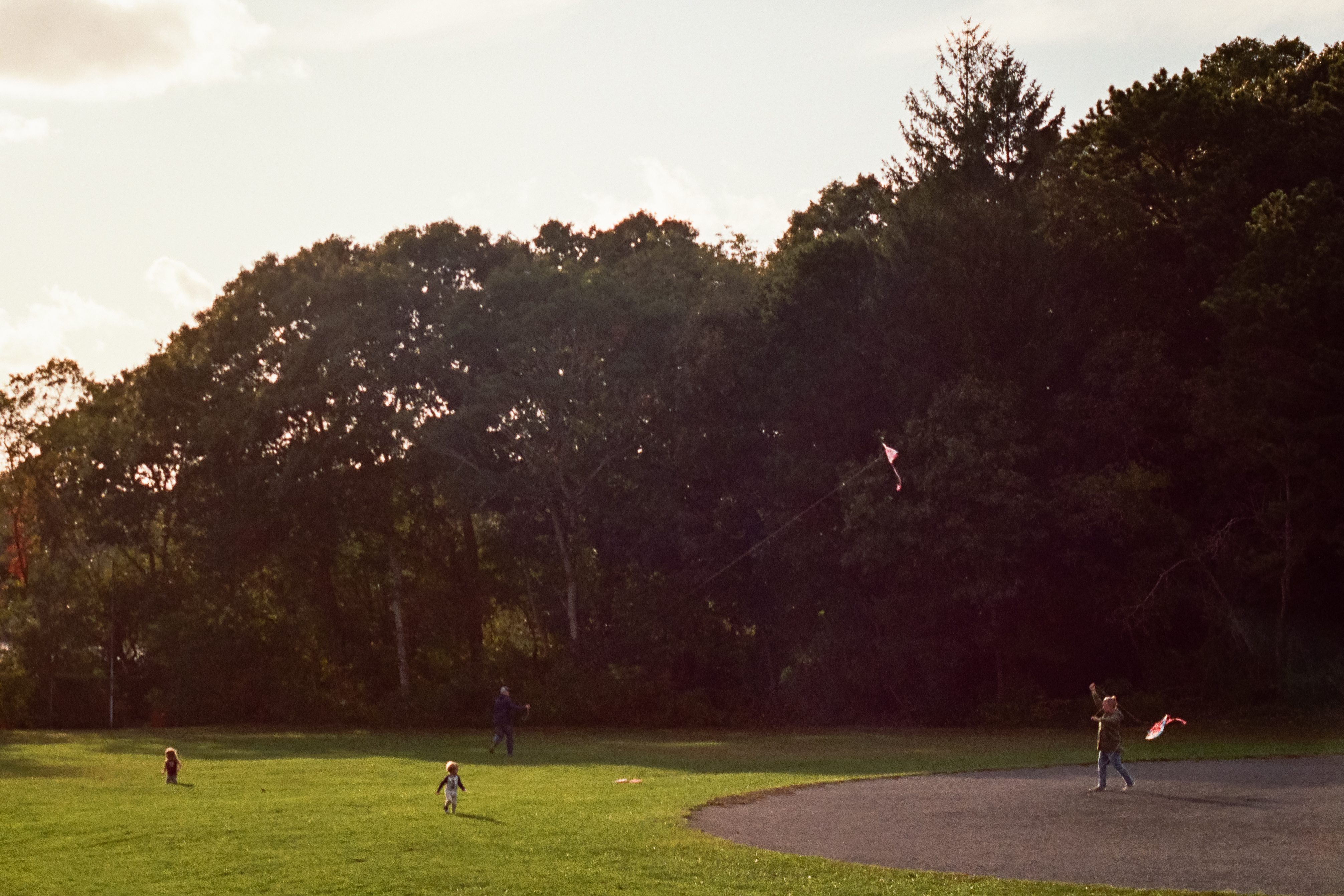 A family flying kites