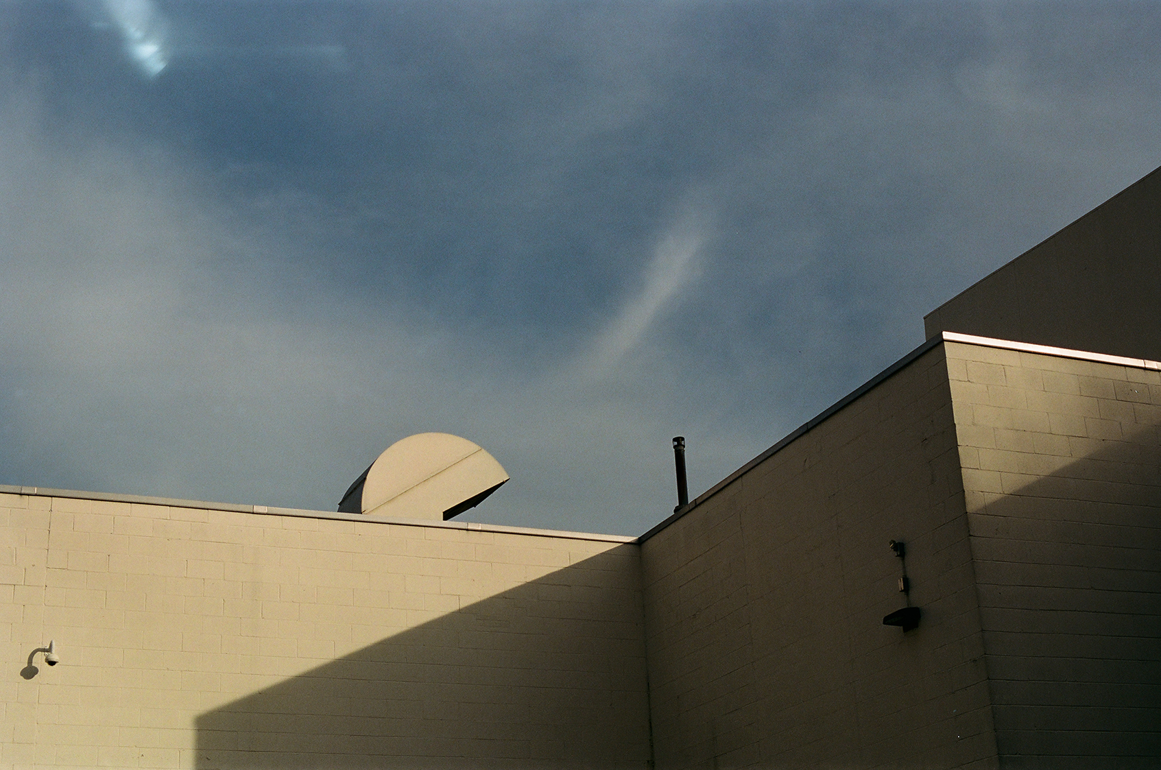 Geometric image of a roof and AC vent