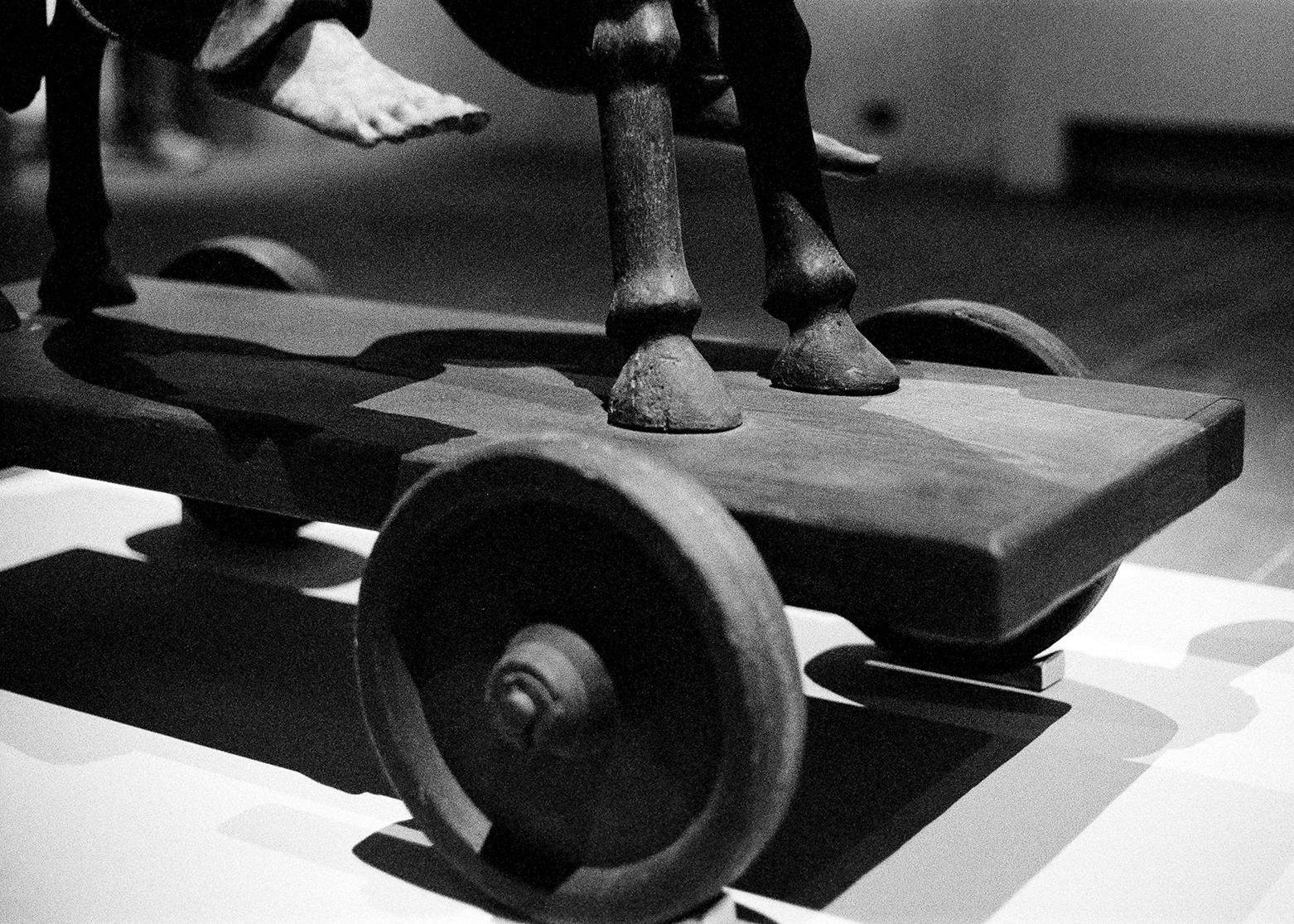 Sculpture of boy riding donkey